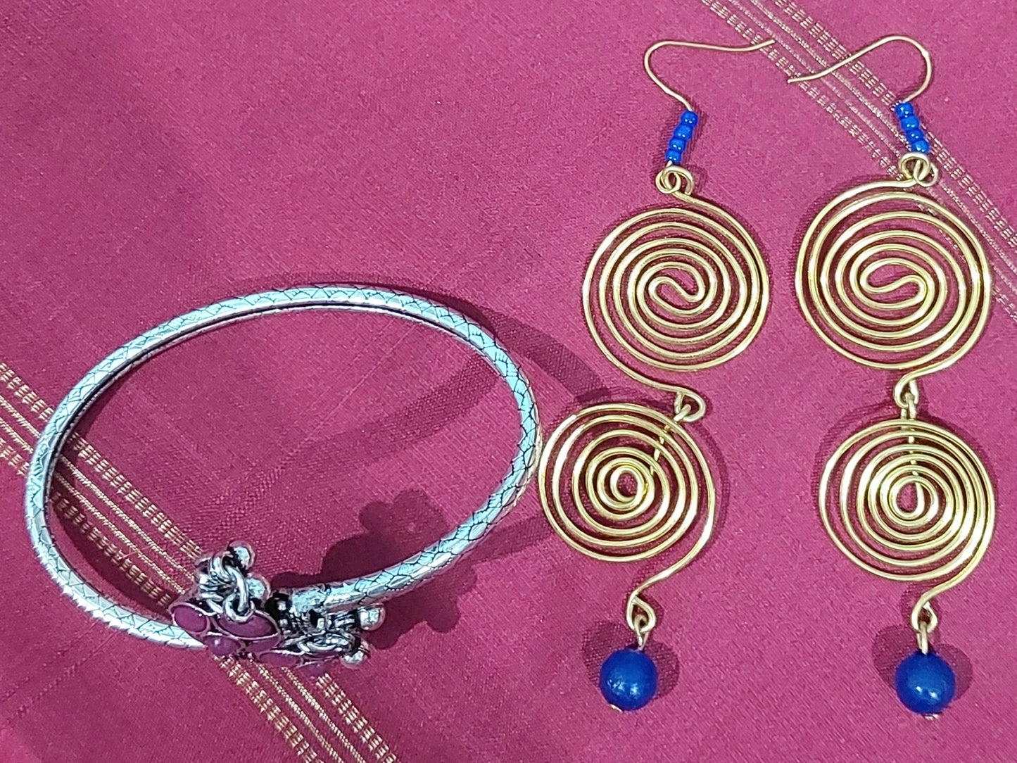 Oxidised Silver matt kundan fancy bracelet with handcrafted gold spiral beads earring