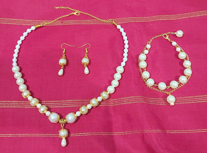 Hand crafted pearl bead necklace with matching earrings & bracelet