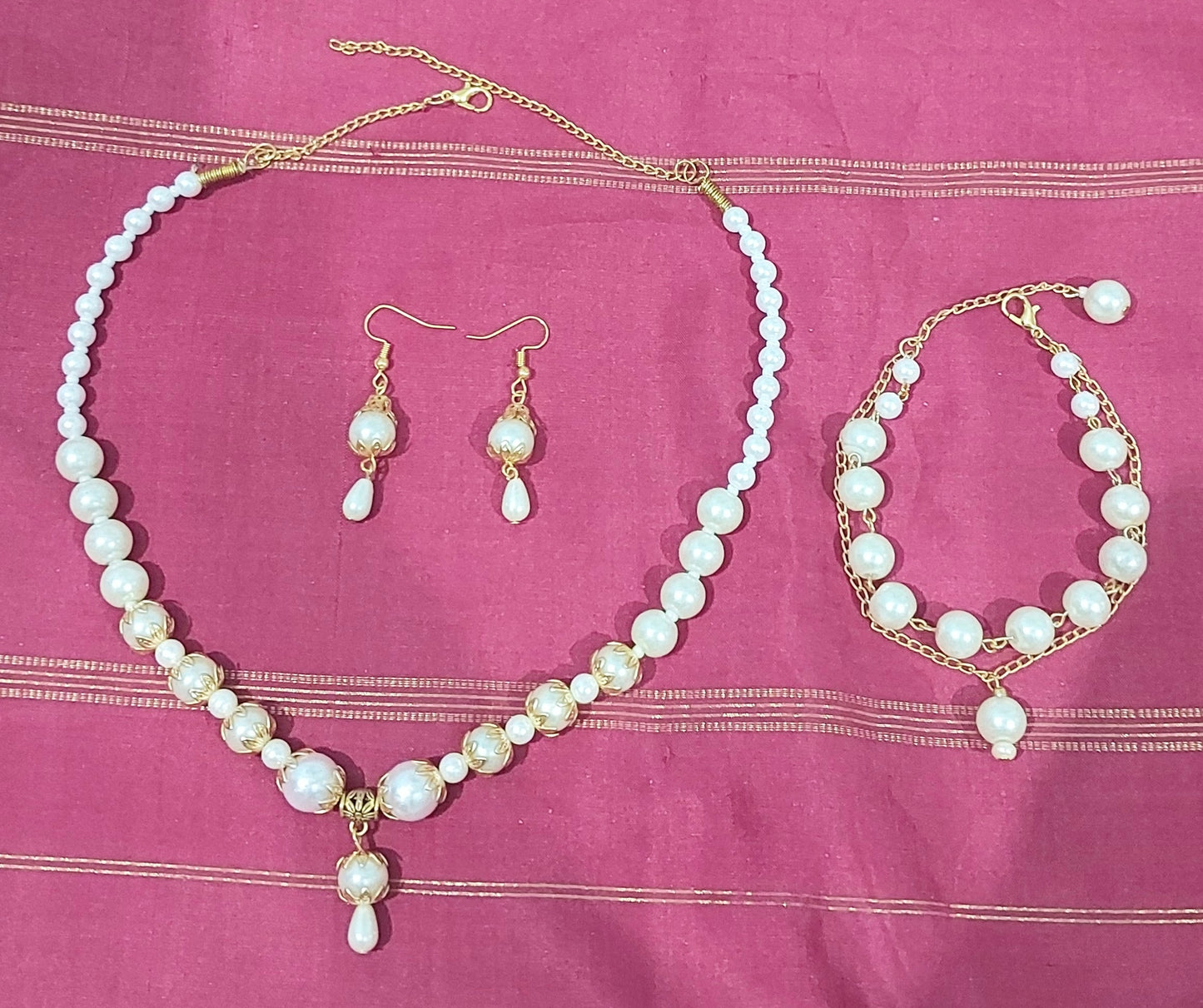 Hand crafted pearl bead necklace with matching earrings & bracelet