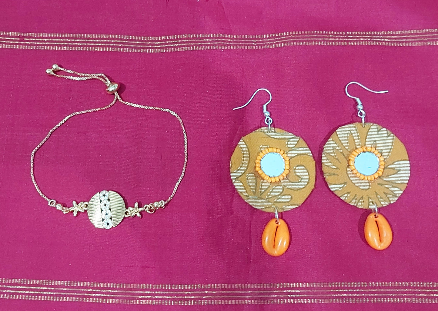 AD stone gold adjustable bracelet  with handcrafted fabric orange shell earring