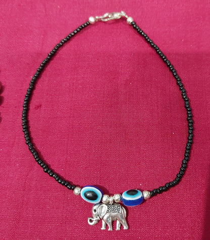 Kundan silver fancy bracelet with handcrafted black beads evil eye bracelet