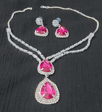 Silver AD stones,monalisa stones & crystals Rani Pink necklace & earrings