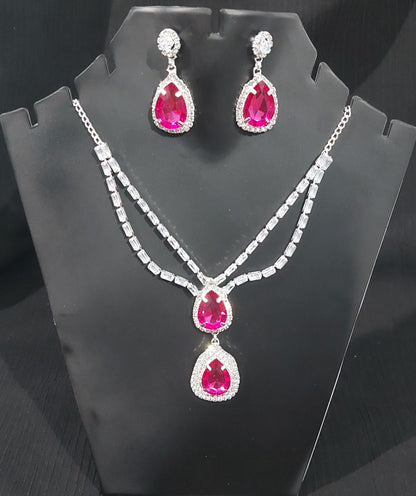 Silver AD stones,monalisa stones & crystals Rani Pink necklace & earrings