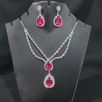 Silver AD stones,monalisa stones & crystals Rani Pink necklace & earrings