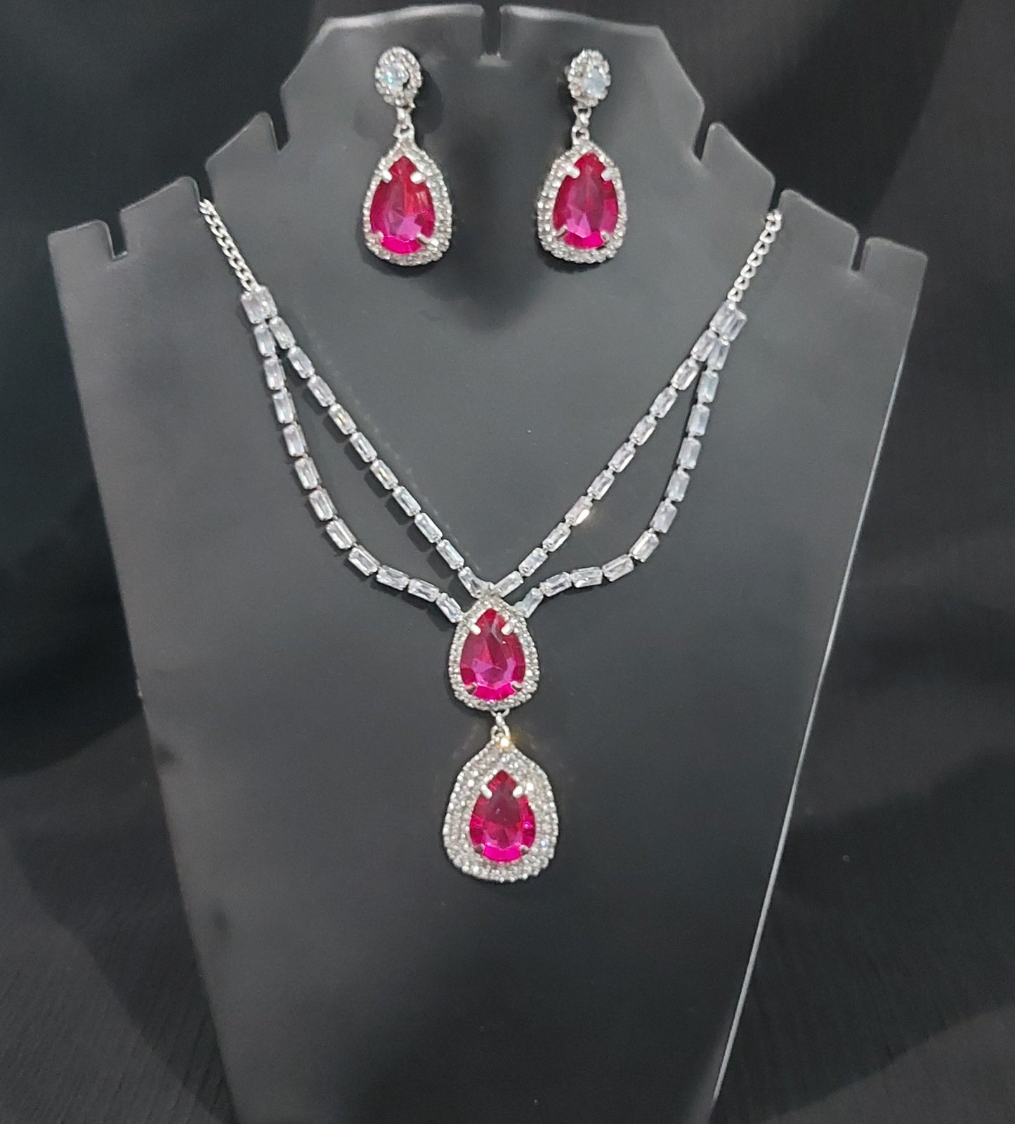 Silver AD stones,monalisa stones & crystals Rani Pink necklace & earrings