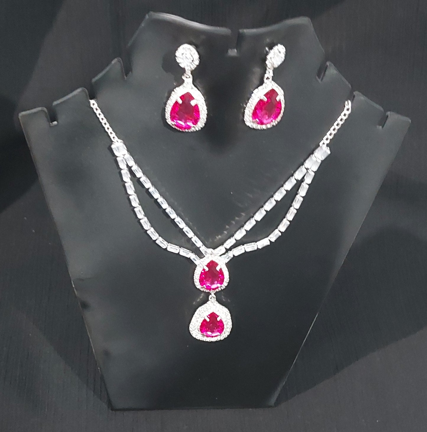 Silver AD stones,monalisa stones & crystals Rani Pink necklace & earrings