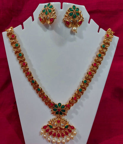 Matt finished kundan gold long  necklace & earrings